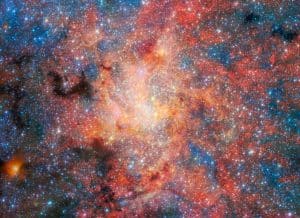 Champ de l'étoile IRS 3 près de Sagittarius A* au centre de la Voie lactée, image NIRCam et MIRI du télescope James Webb